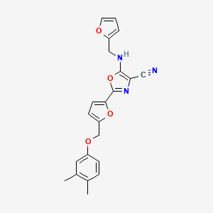 2-{5-[(3,4-Dimethylphenoxy)methyl]furan-2-yl}-5-[(furan-2-ylmethyl)amino]-1,3-oxazole-4-carbonitrile