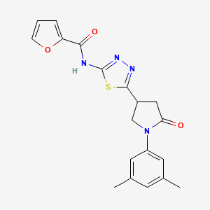 N-{5-[1-(3,5-dimethylphenyl)-5-oxopyrrolidin-3-yl]-1,3,4-thiadiazol-2-yl}furan-2-carboxamide