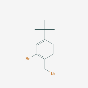 B1499837 2-Bromo-1-(bromomethyl)-4-tert-butylbenzene CAS No. 246139-76-4