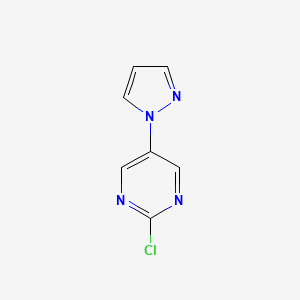 molecular formula C7H5ClN4 B1502602 Pyrimidine, 2-chloro-5-(1H-pyrazol-1-yl)- 