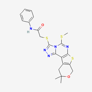 2-[(14,14-dimethyl-7-methylsulfanyl-13-oxa-10-thia-3,4,6,8-tetrazatetracyclo[7.7.0.02,6.011,16]hexadeca-1(9),2,4,7,11(16)-pentaen-5-yl)sulfanyl]-N-phenylacetamide