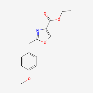 molecular formula C14H15NO4 B15045935 Ethyl 2-(4-Methoxybenzyl)oxazole-4-carboxylate 