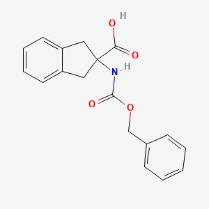 2-(((Benzyloxy)carbonyl)amino)-2,3-dihydro-1H-indene-2-carboxylic acid