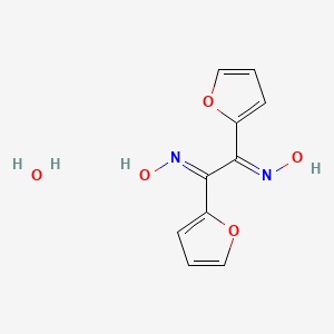 (E)-N-[(2E)-1,2-Bis(furan-2-YL)-2-(hydroxyimino)ethylidene]hydroxylamine hydrate