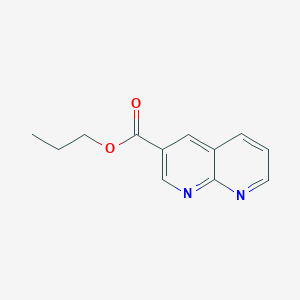 molecular formula C12H12N2O2 B15068701 Propyl 1,8-naphthyridine-3-carboxylate 