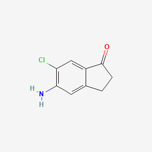 molecular formula C9H8ClNO B15070604 5-Amino-6-chloro-2,3-dihydro-1H-inden-1-one 