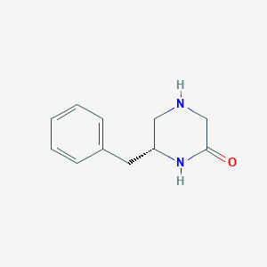 (R)-6-Benzylpiperazin-2-one