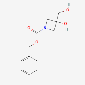 molecular formula C12H15NO4 B15093221 Benzyl 3-hydroxy-3-(hydroxymethyl)azetidine-1-carboxylate 