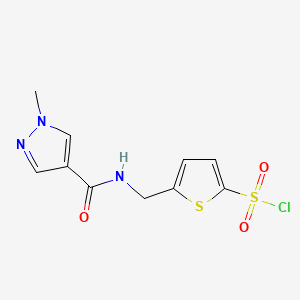 molecular formula C10H10ClN3O3S2 B15094079 5-{[(1-methyl-1H-pyrazol-4-yl)formamido]methyl}thiophene-2-sulfonyl chloride 