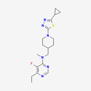 molecular formula C18H25FN6S B15116537 N-{[1-(5-cyclopropyl-1,3,4-thiadiazol-2-yl)piperidin-4-yl]methyl}-6-ethyl-5-fluoro-N-methylpyrimidin-4-amine 