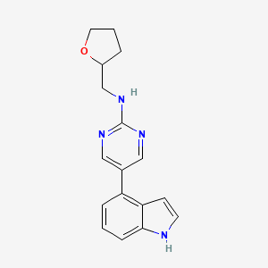 5-(1H-indol-4-yl)-N-[(oxolan-2-yl)methyl]pyrimidin-2-amine