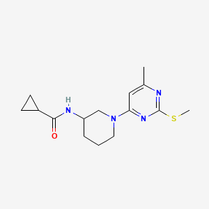 molecular formula C15H22N4OS B15120423 N-{1-[6-methyl-2-(methylsulfanyl)pyrimidin-4-yl]piperidin-3-yl}cyclopropanecarboxamide 