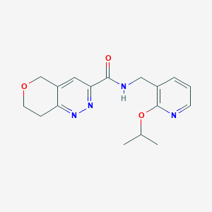 N-{[2-(propan-2-yloxy)pyridin-3-yl]methyl}-5H,7H,8H-pyrano[4,3-c]pyridazine-3-carboxamide