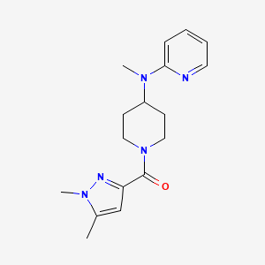 molecular formula C17H23N5O B15121196 N-[1-(1,5-dimethyl-1H-pyrazole-3-carbonyl)piperidin-4-yl]-N-methylpyridin-2-amine 