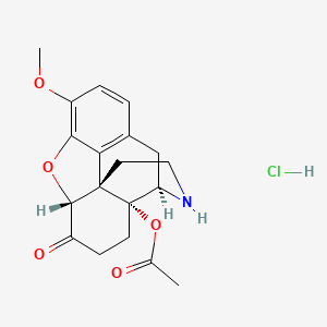 molecular formula C19H22ClNO5 B1514409 [(4R,4Ar,7aR,12bS)-9-methoxy-7-oxo-1,2,3,4,5,6,7a,13-octahydro-4,12-methanobenzofuro[3,2-e]isoquinolin-4a-yl] acetate;hydrochloride CAS No. 70866-63-6