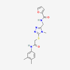 N-{[5-({2-[(3,4-dimethylphenyl)amino]-2-oxoethyl}sulfanyl)-4-methyl-4H-1,2,4-triazol-3-yl]methyl}furan-2-carboxamide