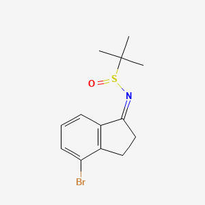 (Z)-N-(4-bromo-2,3-dihydro-1H-inden-1-ylidene)-2-methylpropane-2-sulfinamide