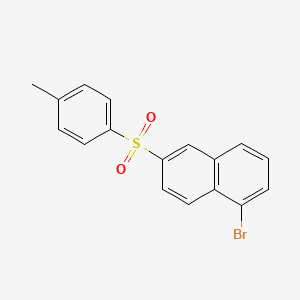 1-Bromo-6-(4-methylbenzene-1-sulfonyl)naphthalene