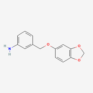 3-[(2H-1,3-benzodioxol-5-yloxy)methyl]aniline