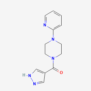 B1518247 1-(1H-pyrazole-4-carbonyl)-4-(pyridin-2-yl)piperazine CAS No. 1153251-03-6