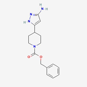 molecular formula C16H20N4O2 B15204842 1-Piperidinecarboxylic acid, 4-(5-amino-1H-pyrazol-3-yl)-, phenylmethyl ester 