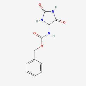 molecular formula C11H11N3O4 B15218136 Benzyl (2,5-dioxoimidazolidin-4-yl)carbamate CAS No. 111140-90-0