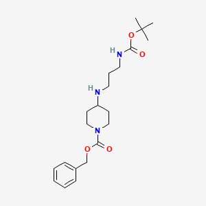 molecular formula C21H33N3O4 B1522096 Benzyl 4-[(3-{[(tert-butoxy)carbonyl]amino}propyl)amino]piperidine-1-carboxylate CAS No. 936129-65-6