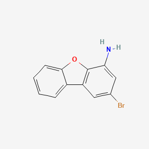 molecular formula C12H8BrNO B15221661 2-Bromodibenzo[b,d]furan-4-amine 