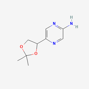 molecular formula C9H13N3O2 B15224561 5-(2,2-Dimethyl-1,3-dioxolan-4-yl)pyrazin-2-amine 