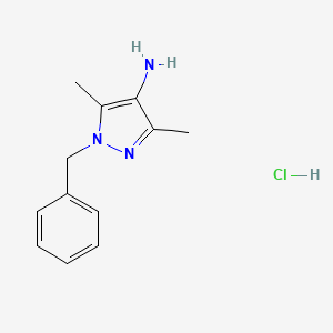 molecular formula C12H16ClN3 B1522514 1-Benzyl-3,5-dimethyl-1H-pyrazol-4-amine hydrochloride CAS No. 20737-84-2
