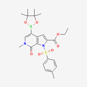 ethyl 6-methyl-7-oxo-4-(4,4,5,5-tetramethyl-1,3,2-dioxaborolan-2-yl)-1-tosyl-6,7-dihydro-1H-pyrrolo[2,3-c]pyridine-2-carboxylate