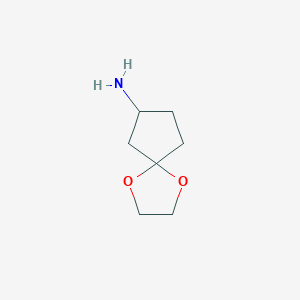 molecular formula C7H13NO2 B1523348 1,4-二氧杂螺[4.4]壬烷-7-胺 CAS No. 1322805-04-8