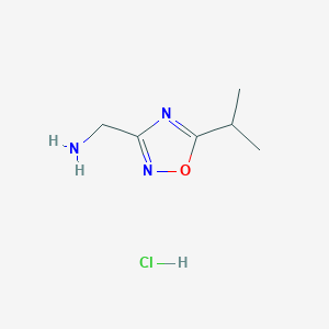molecular formula C6H12ClN3O B1523570 [(5-Isopropyl-1,2,4-oxadiazol-3-yl)methyl]amine hydrochloride CAS No. 1255717-36-2