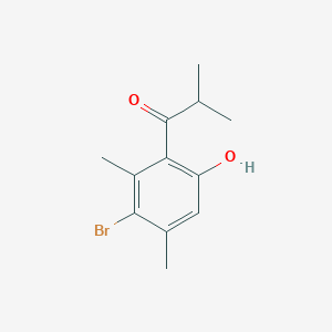 molecular formula C12H15BrO2 B15240682 1-(3-Bromo-6-hydroxy-2,4-dimethylphenyl)-2-methylpropan-1-one 