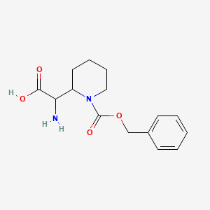 B1524307 2-Amino-2-(1-((benzyloxy)carbonyl)piperidin-2-yl)acetic acid CAS No. 1255098-46-4