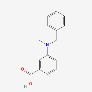 3-[Benzyl(methyl)amino]benzoic acid