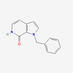 molecular formula C14H12N2O B1524866 1-benzyl-1H,6H,7H-pyrrolo[2,3-c]pyridin-7-one CAS No. 60290-20-2