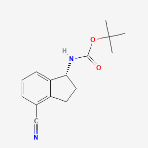 molecular formula C15H18N2O2 B1524934 (R)-叔丁基(4-氰基-2,3-二氢-1H-茚-1-基)氨基甲酸酯 CAS No. 1306763-30-3