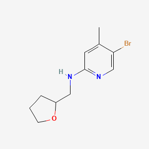 molecular formula C11H15BrN2O B1525317 5-bromo-4-methyl-N-(oxolan-2-ylmethyl)pyridin-2-amine CAS No. 1220017-04-8