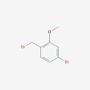 molecular formula C8H8Br2O B1525346 4-Bromo-1-(bromomethyl)-2-methoxybenzene CAS No. 854778-42-0