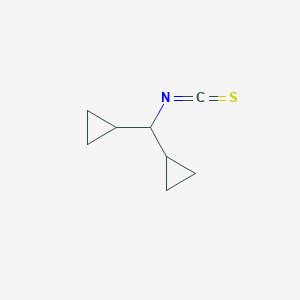 B1525471 [Cyclopropyl(isothiocyanato)methyl]cyclopropane CAS No. 1247603-60-6