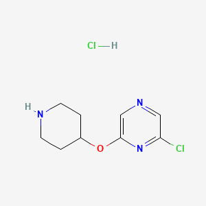 molecular formula C9H13Cl2N3O B1525682 2-Chloro-6-(piperidin-4-yloxy)pyrazine hydrochloride CAS No. 1220036-90-7