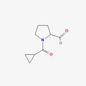 molecular formula C9H13NO2 B15259258 1-Cyclopropanecarbonylpyrrolidine-2-carbaldehyde 