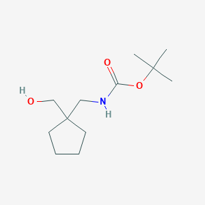molecular formula C12H23NO3 B1526329 tert-Butyl ((1-(hydroxymethyl)cyclopentyl)methyl)carbamate CAS No. 223763-91-5