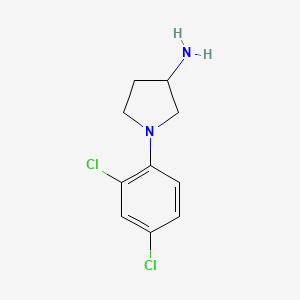 molecular formula C10H12Cl2N2 B1526410 1-(2,4-Dichlorophenyl)pyrrolidin-3-amine CAS No. 1184048-92-7