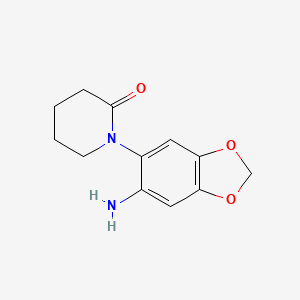 molecular formula C12H14N2O3 B1526871 1-(6-Amino-1,3-benzodioxol-5-yl)piperidin-2-one CAS No. 1366386-67-5