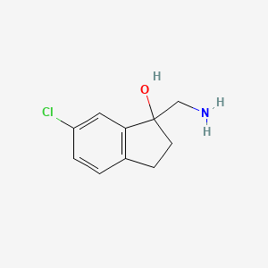 molecular formula C10H12ClNO B1527037 1-(Aminomethyl)-6-chloro-2,3-dihydroinden-1-ol CAS No. 1082563-11-8