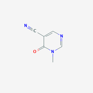 molecular formula C6H5N3O B1527117 1-Methyl-6-oxo-1,6-dihydropyrimidine-5-carbonitrile CAS No. 1330756-29-0