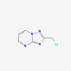 molecular formula C6H5ClN4 B1527137 2-(クロロメチル)[1,2,4]トリアゾロ[1,5-a]ピリミジン CAS No. 1338495-29-6