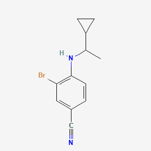 molecular formula C12H13BrN2 B15273231 3-Bromo-4-[(1-cyclopropylethyl)amino]benzonitrile 